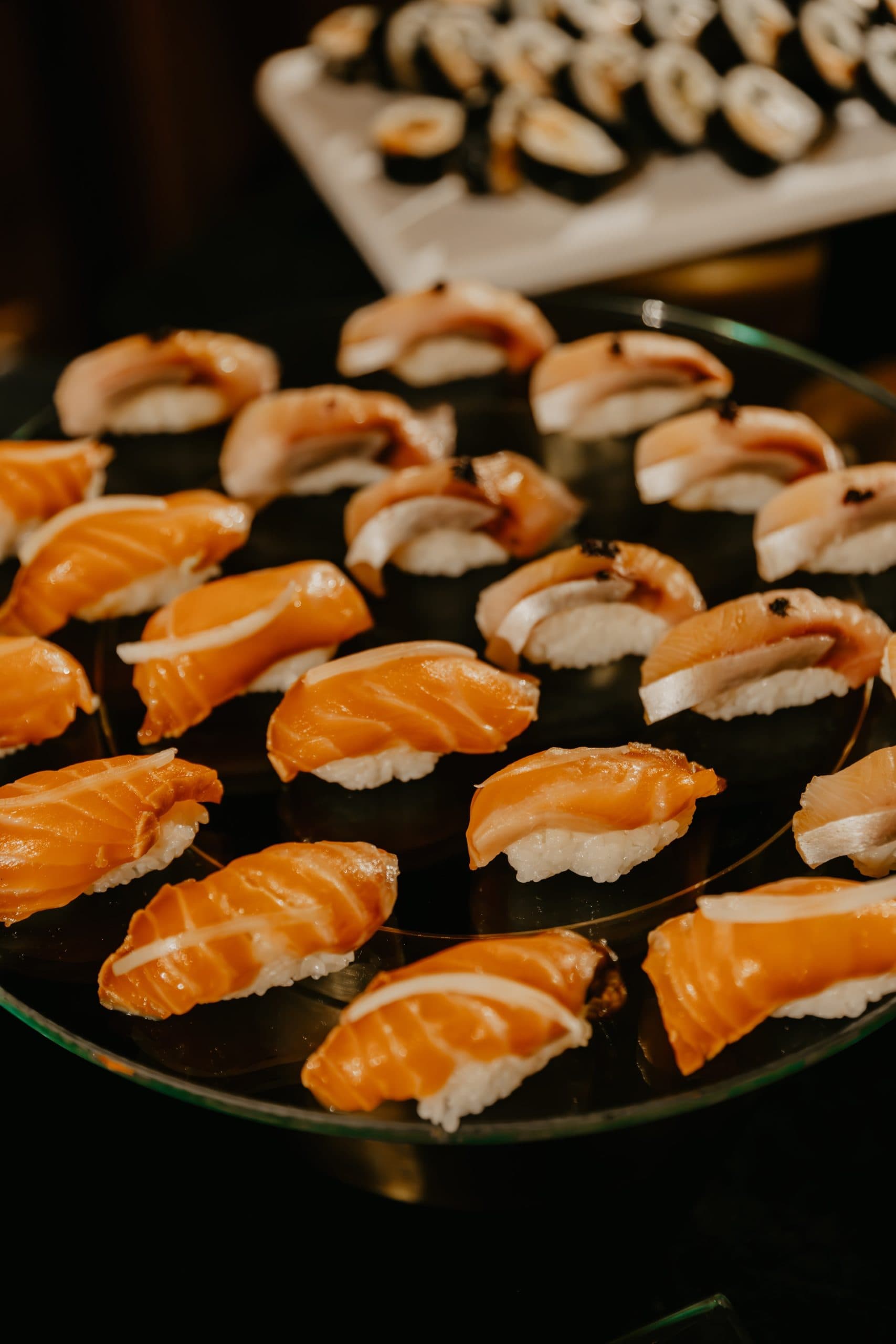 Sushi and Sashimi on a platter.